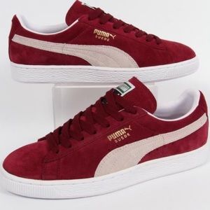 Burgundy pumas. Never worn. Size 8.